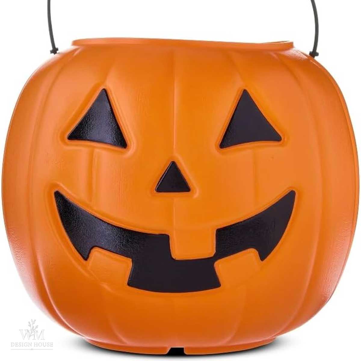 An orange plastic pumpkin bucket with a black handle, featuring a carved smiling jack-o’-lantern face, commonly used for Halloween trick-or-treating or as inspiration for halloween lanterns diy projects.